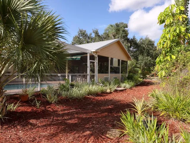 a garden view with a sitting space