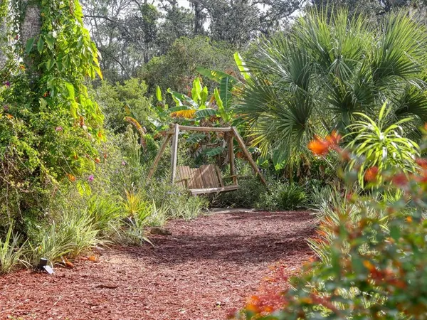 a view of a lake with a big yard