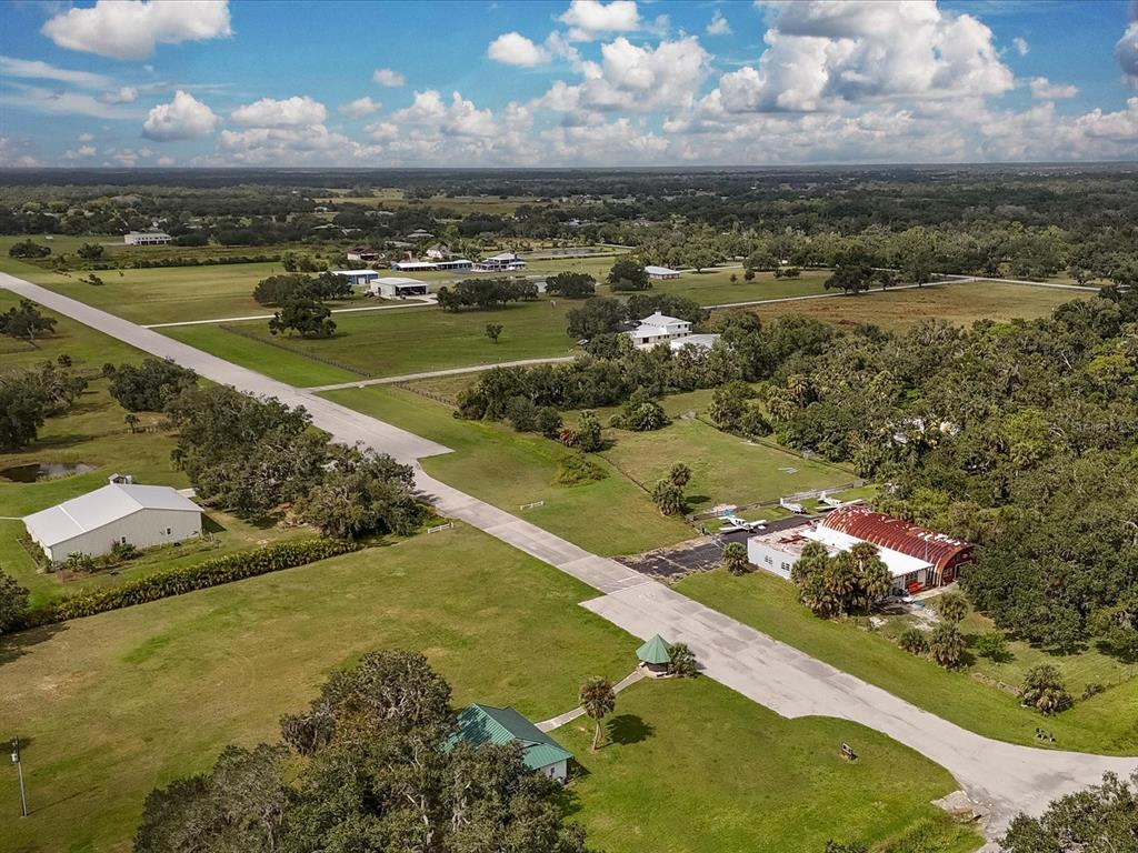 4708 Hidden River Road Sarasota, FL 34240 - Photo 61 of 67 a view of a city with an ocean