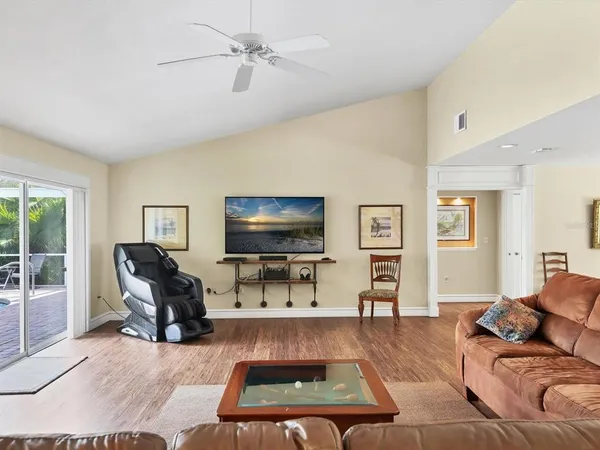 a living room with furniture and a window