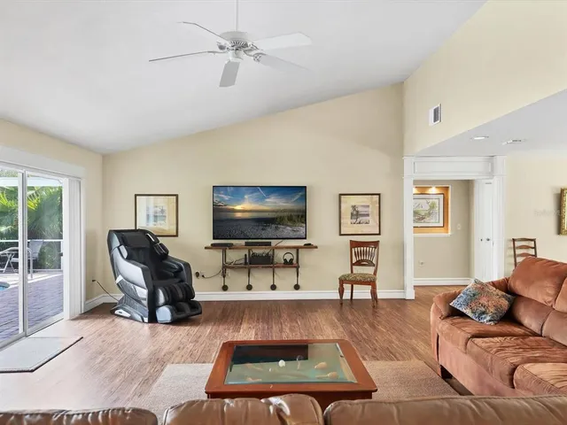a living room with furniture and a window
