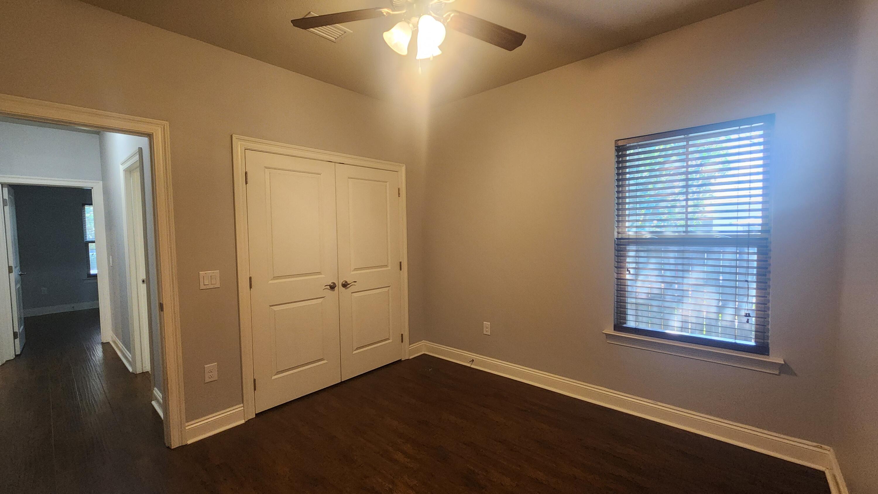 2133 Janet Street Navarre, FL 32566 - Photo 7 of 14 a view of a livingroom with a window