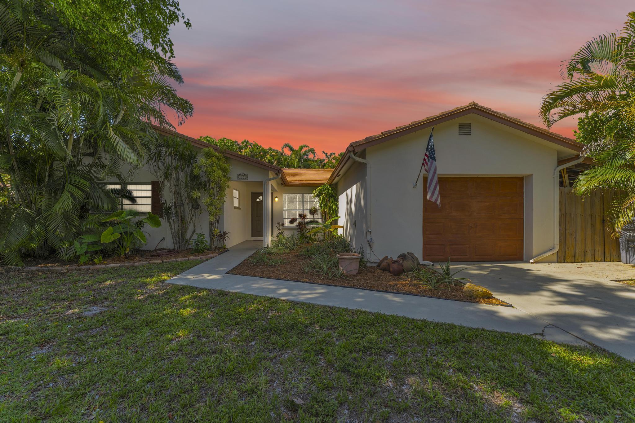 8858 Southwest 8th Street Boca Raton, FL 33433 - Photo 1 of 27 Evening Front View