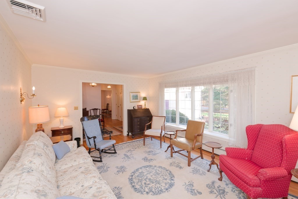 152 Wayside Inn Road Marlborough, MA 01752 - Photo 4 of 33 a view of a livingroom with workspace and a couch