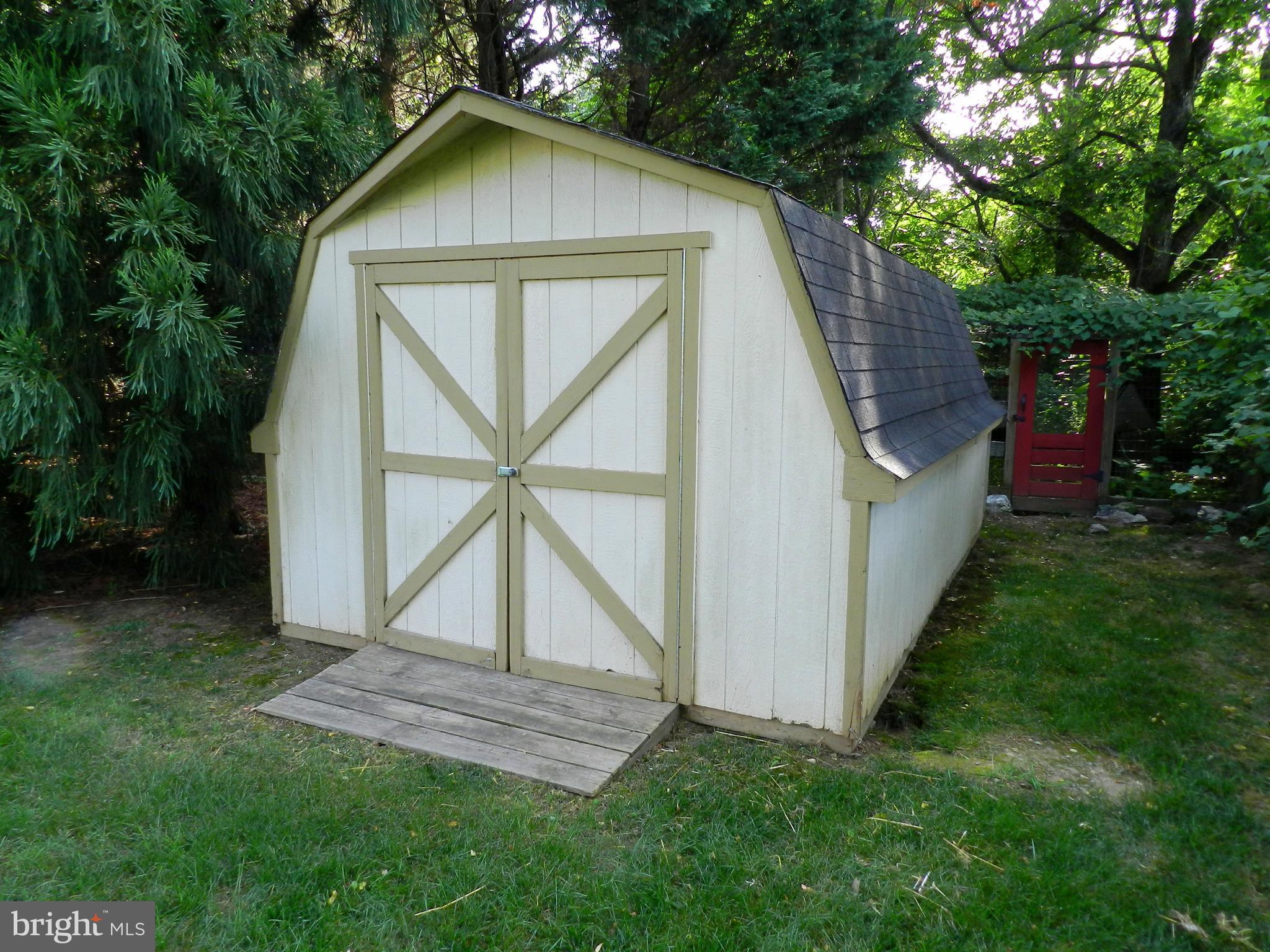 20006 Hickman Way Poolesville, MD 20837 - Photo 29 of 30 Large shed has room for tractor and bikes