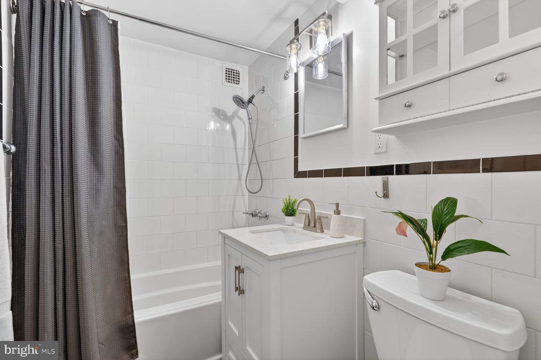 3900 Tunlaw Road Northwest, Unit 206 Washington, DC 20007 - Photo 16 of 28 Modern, sleek Bathroom