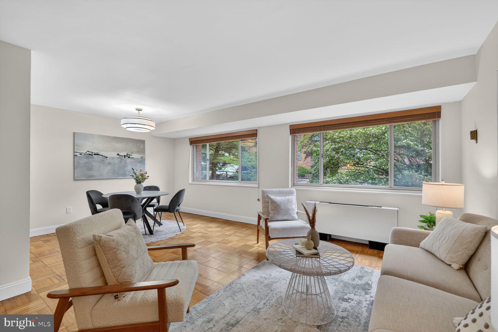 3900 Tunlaw Road Northwest, Unit 206 Washington, DC 20007 - Photo 3 of 28 Look at that wall of windows!