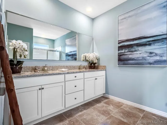 a view of cabinets and wooden floor