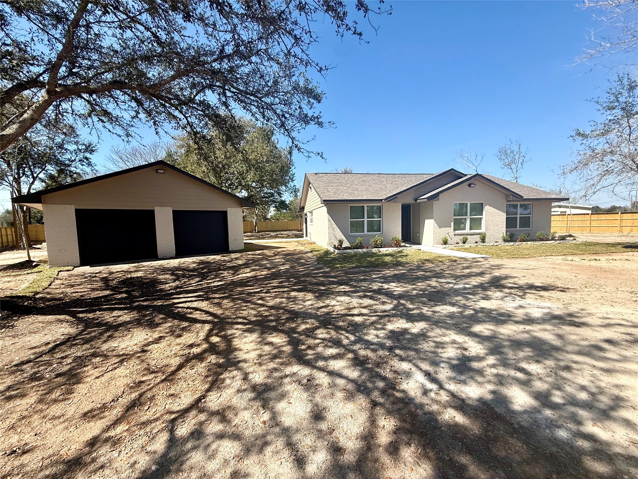 4835 County Road 380 Rosharon, TX 77583 - Photo 1 of 38 a view of a house with a yard