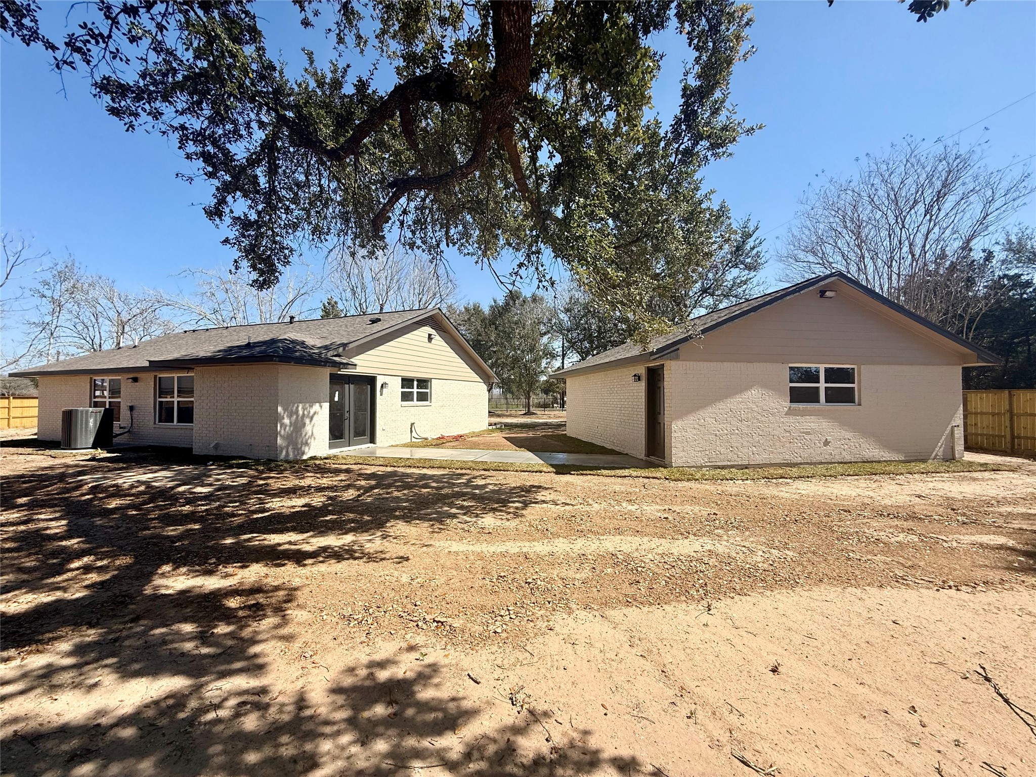 4835 County Road 380 Rosharon, TX 77583 - Photo 27 of 38 a view of a house with a yard