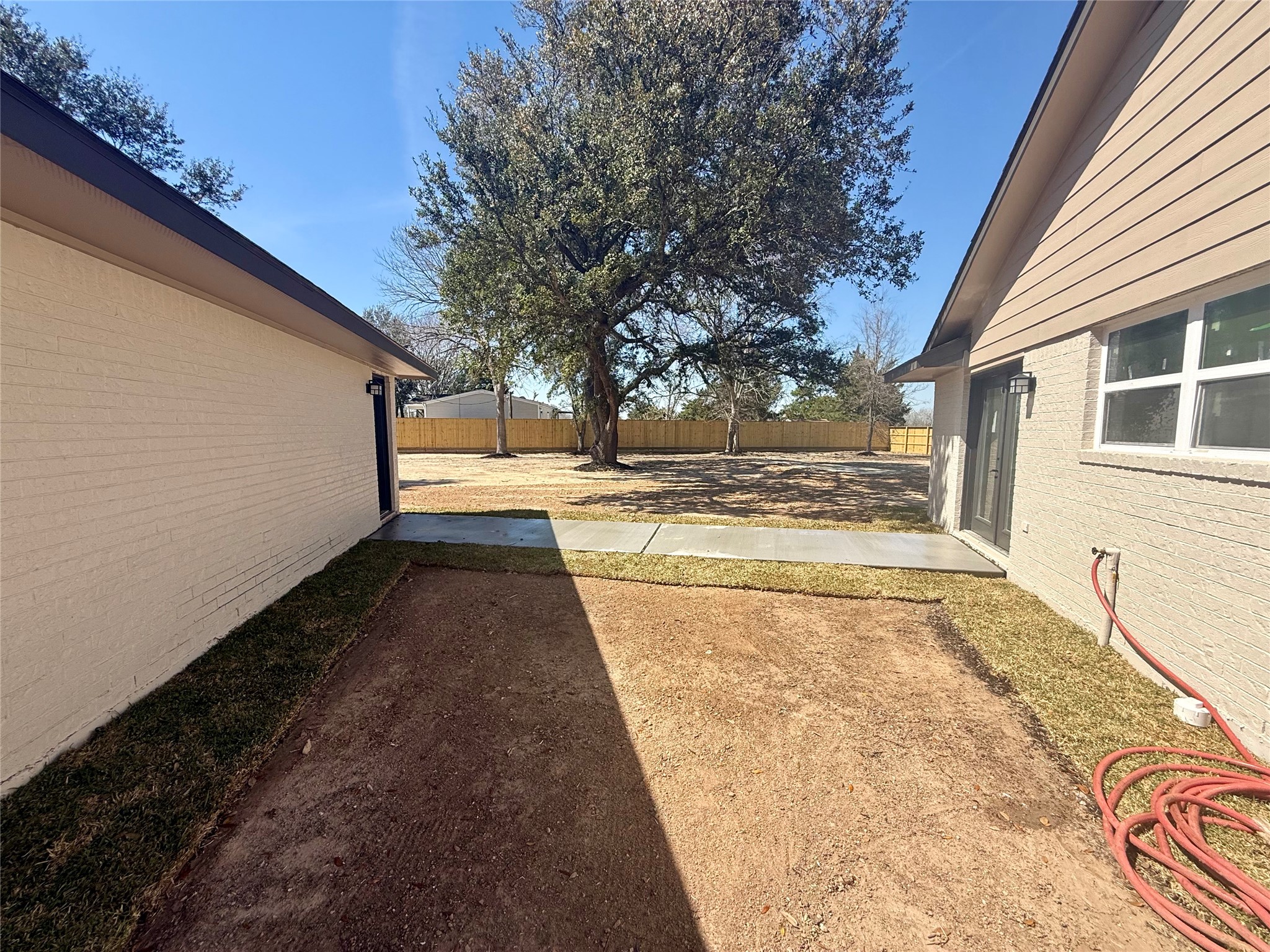 4835 County Road 380 Rosharon, TX 77583 - Photo 28 of 38 a view of a backyard with large trees