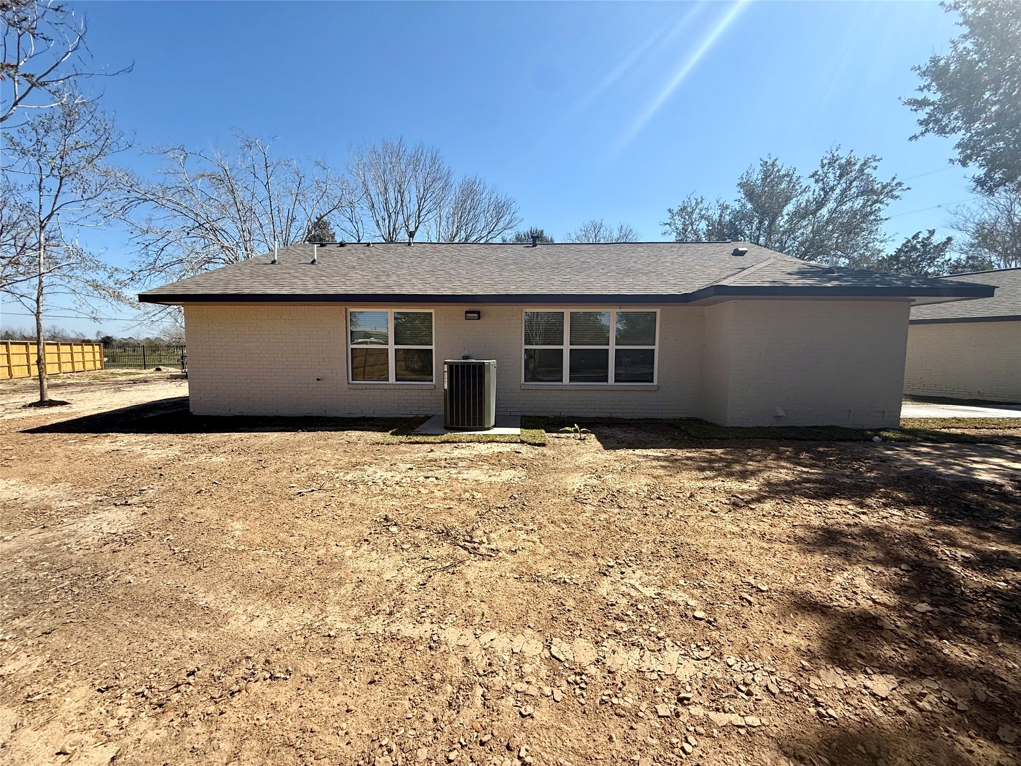 4835 County Road 380 Rosharon, TX 77583 - Photo 29 of 38 a house with trees in the background