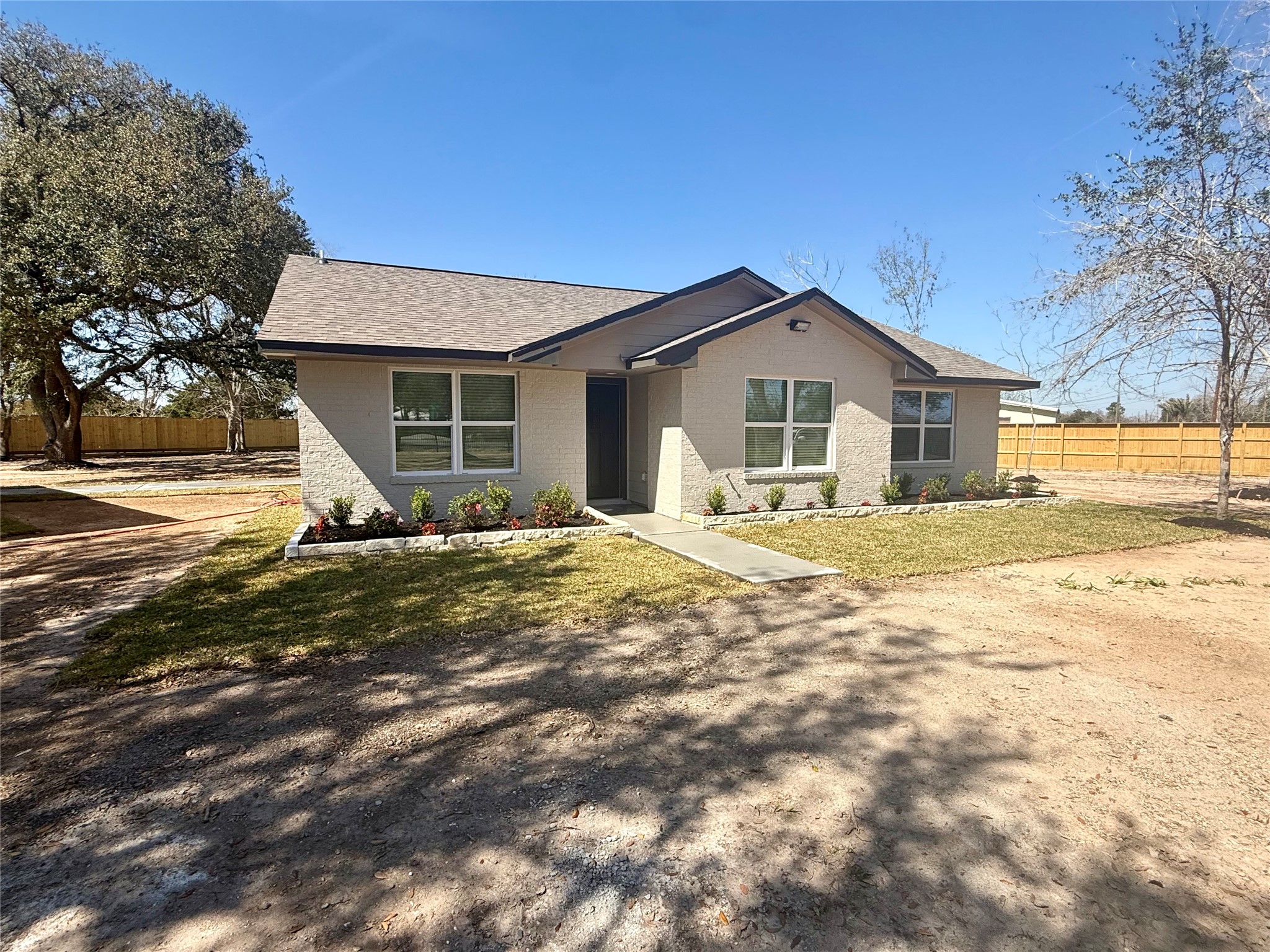 4835 County Road 380 Rosharon, TX 77583 - Photo 33 of 38 a view of a house with a yard