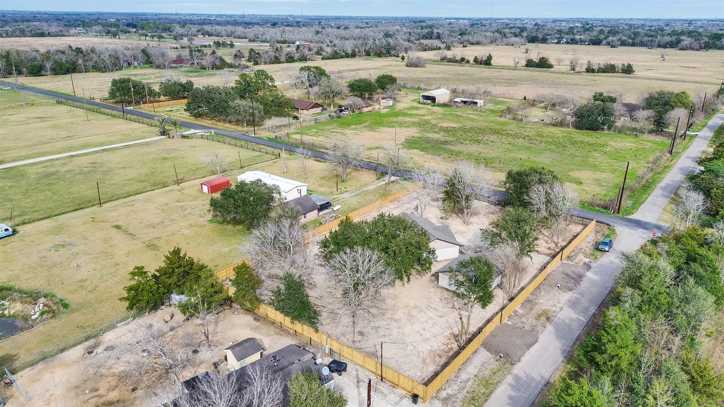 4835 County Road 380 Rosharon, TX 77583 - Photo 34 of 38 an aerial view of residential houses with outdoor space