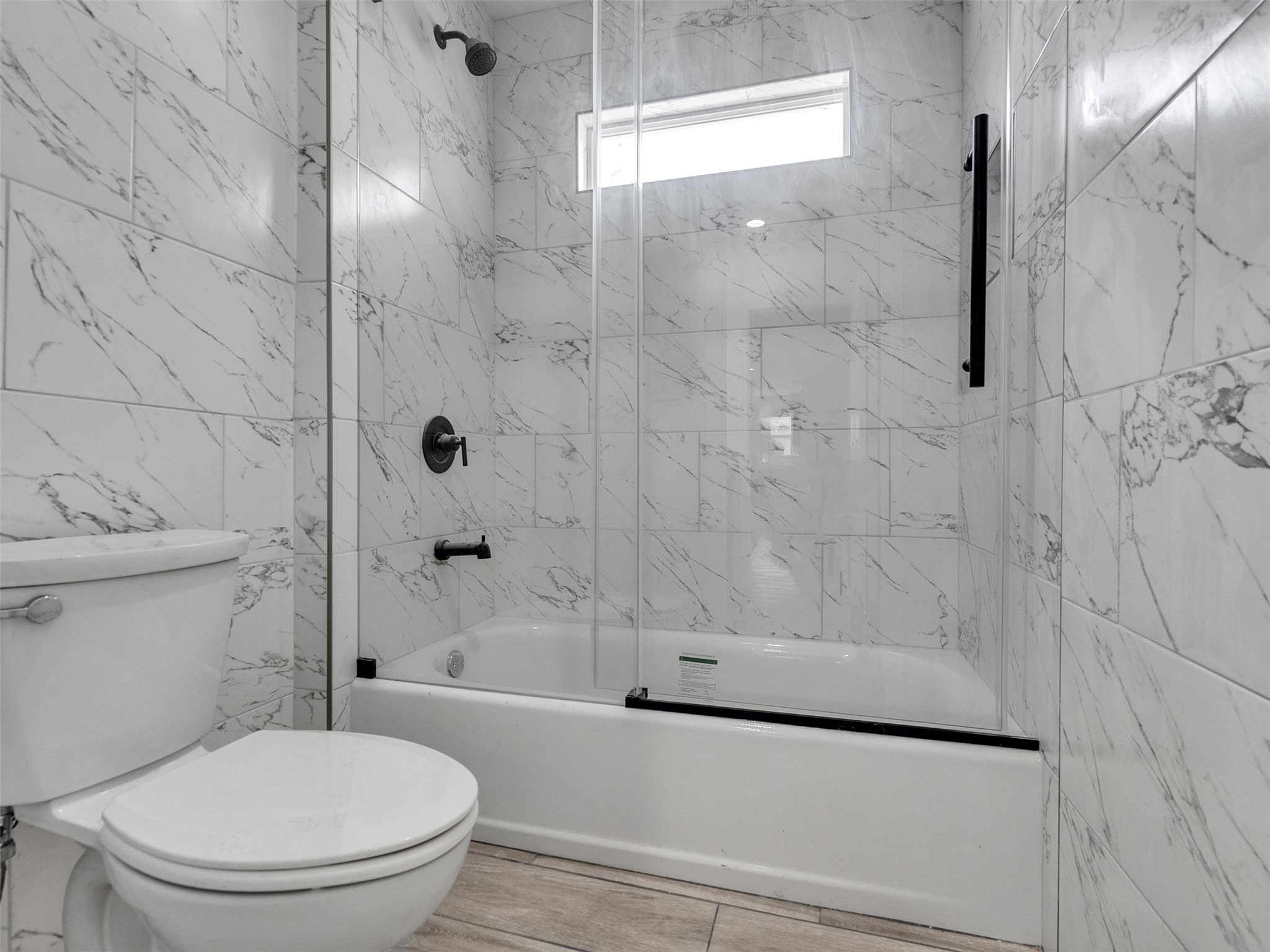 4835 County Road 380 Rosharon, TX 77583 - Photo 10 of 38 a white toilet sitting next to a bath tub and shower