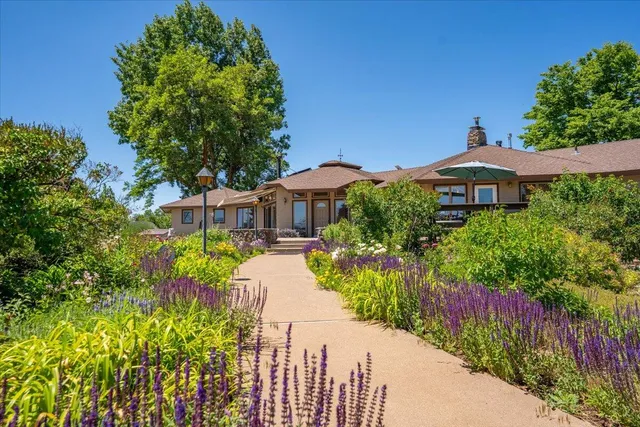 a view of a town with mountains in the background