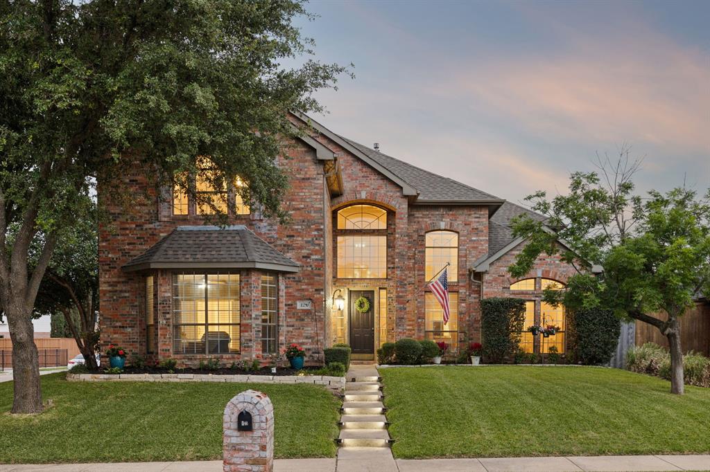 129 Timberbluff Lane Murphy, TX 75094 - Photo 1 of 34 a front view of a house with a yard