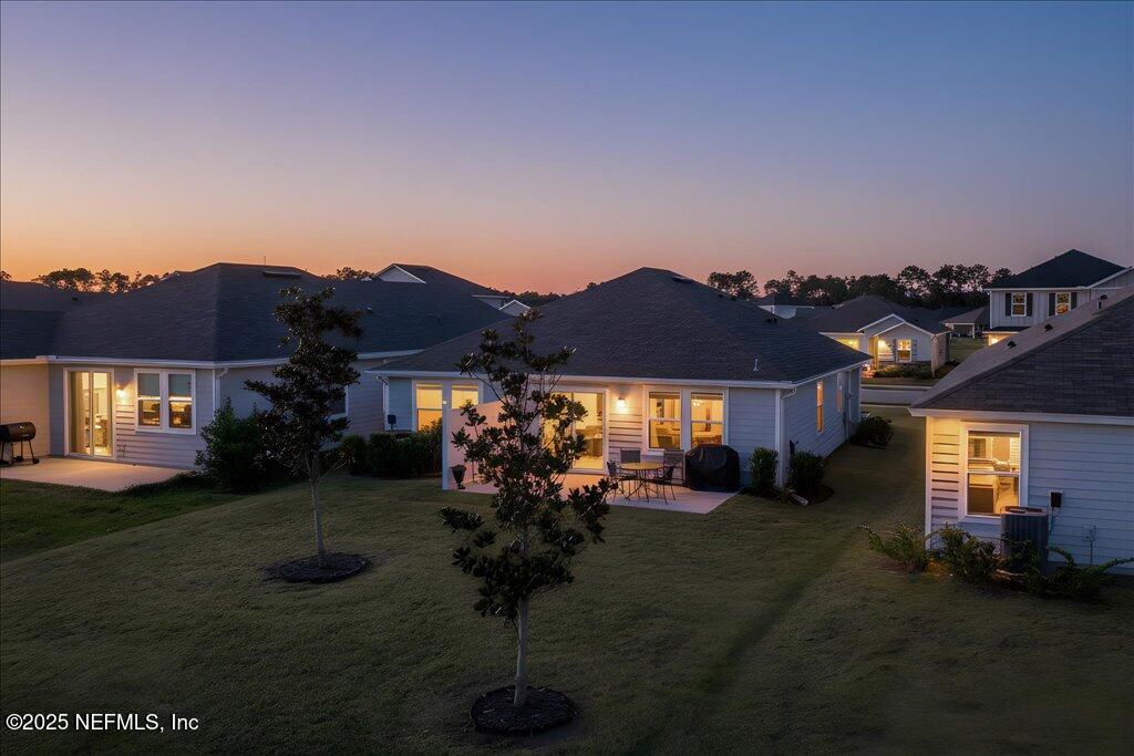 7 Windsor Place Palm Coast, FL 32164 - Photo 26 of 40 a view of house with a yard