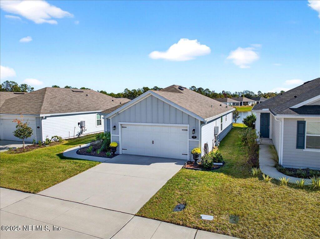 7 Windsor Place Palm Coast, FL 32164 - Photo 37 of 40 a view of outdoor space yard and front view of a house