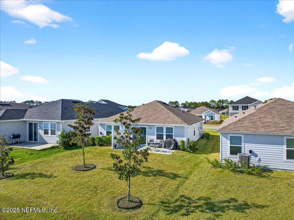 7 Windsor Place Palm Coast, FL 32164 - Photo 39 of 40 a view of a house with a swimming pool