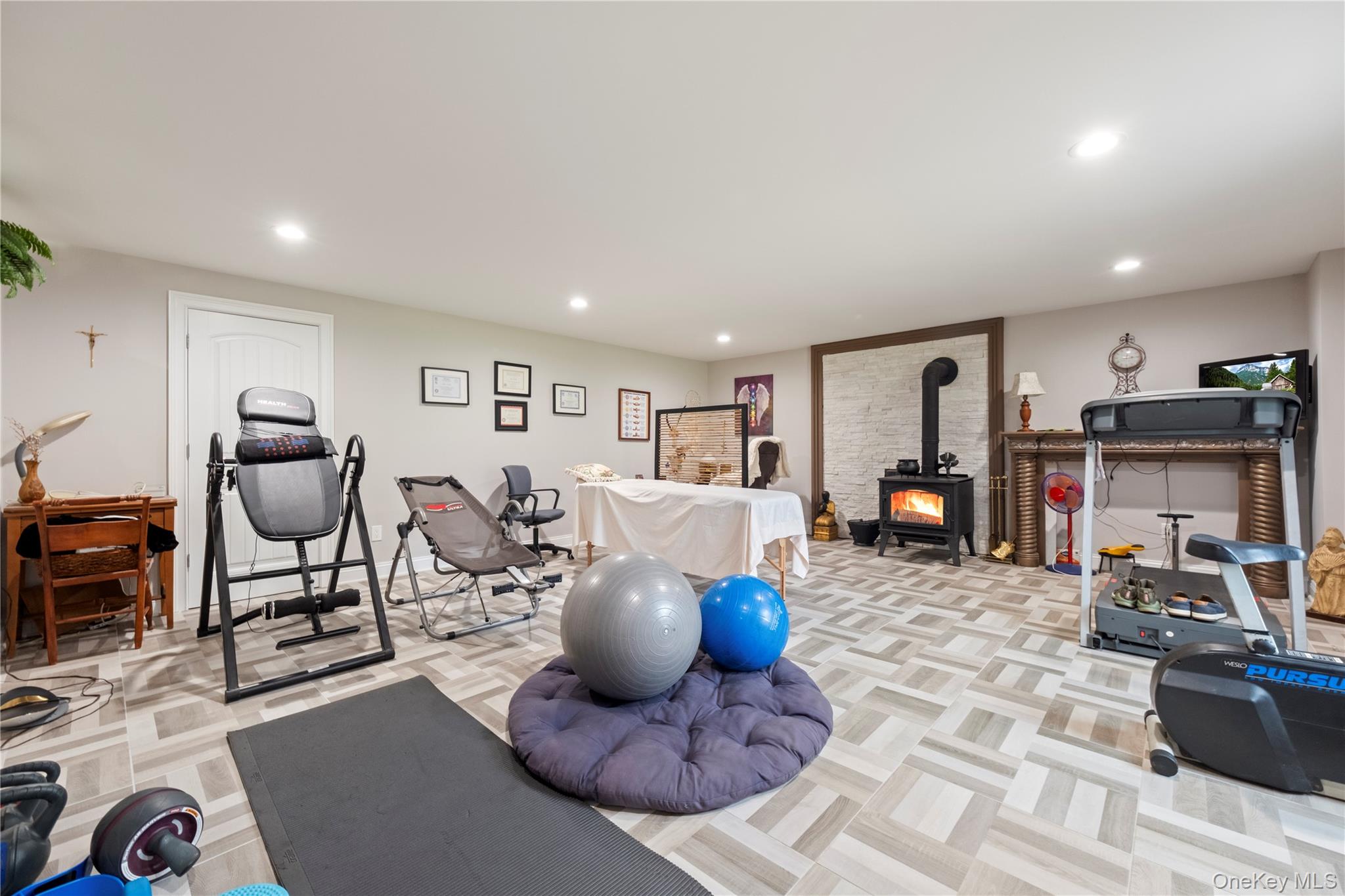 174 Webber Road Coxsackie, NY 12058 - Photo 36 of 50 a living room with furniture a flat screen tv and kitchen view
