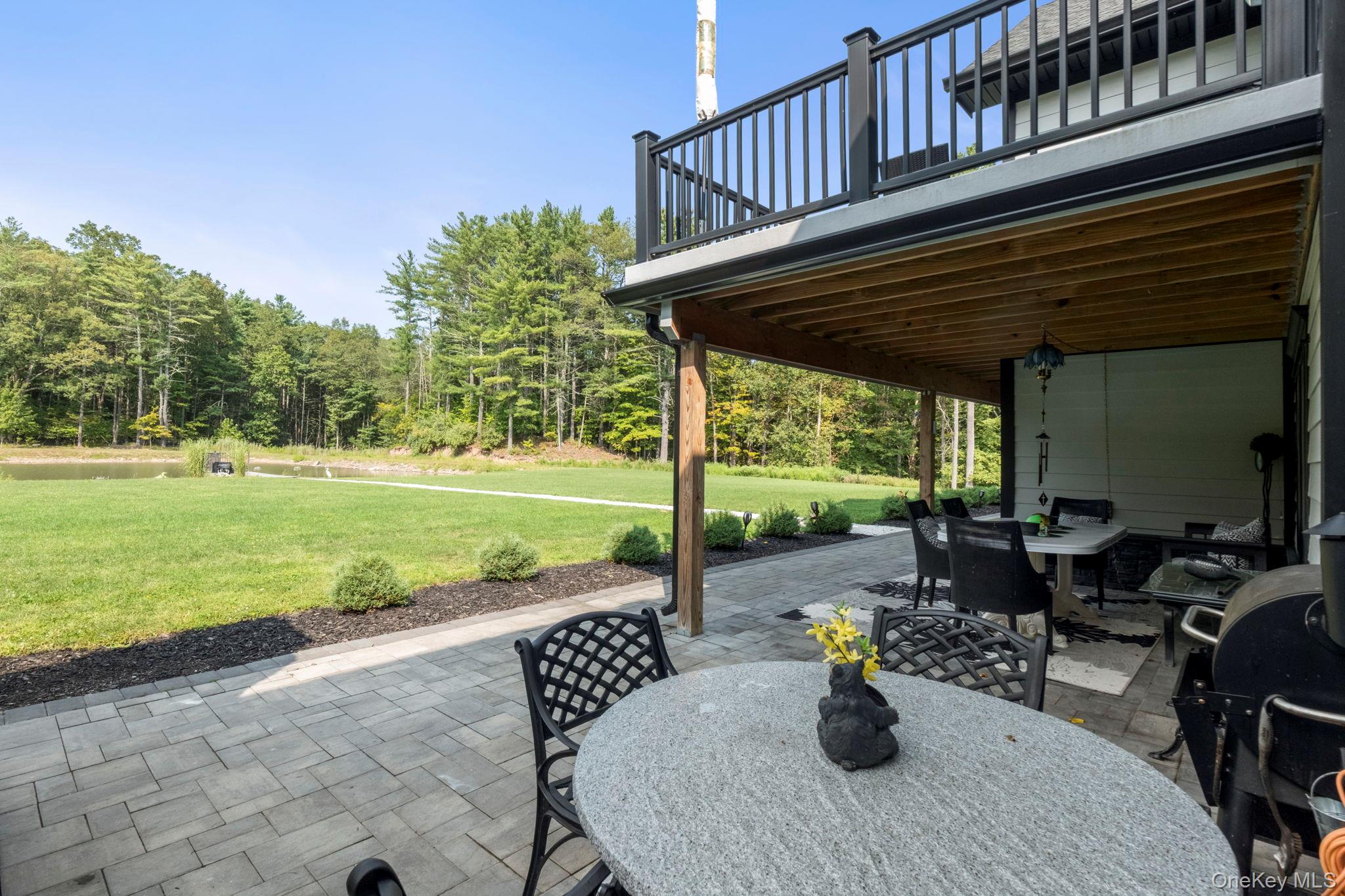 174 Webber Road Coxsackie, NY 12058 - Photo 42 of 50 a view of a backyard with sitting area