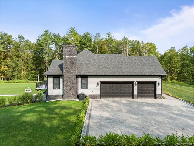 a house view with a garden space