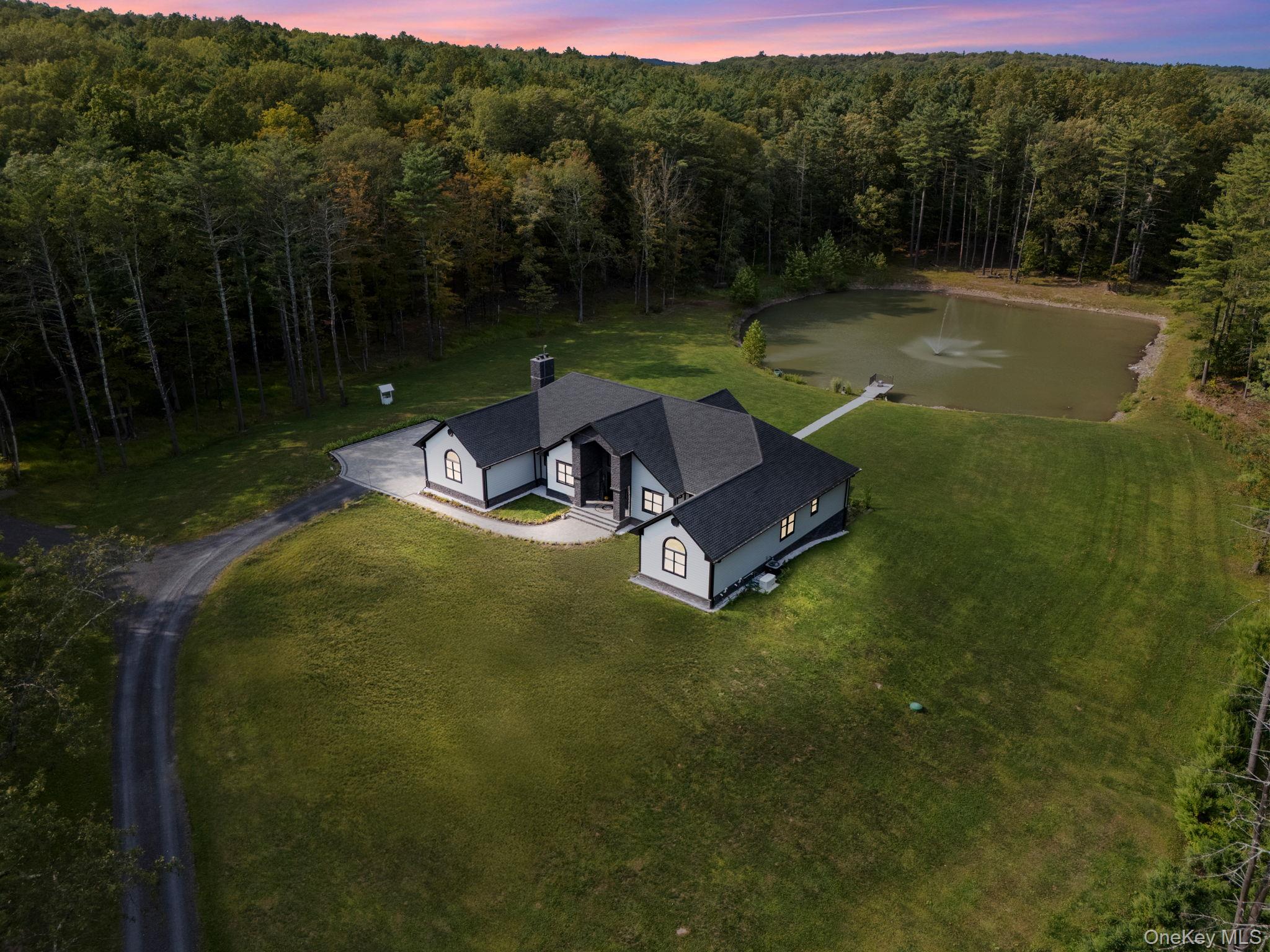 174 Webber Road Coxsackie, NY 12058 - Photo 46 of 50 a view of a lake with a yard