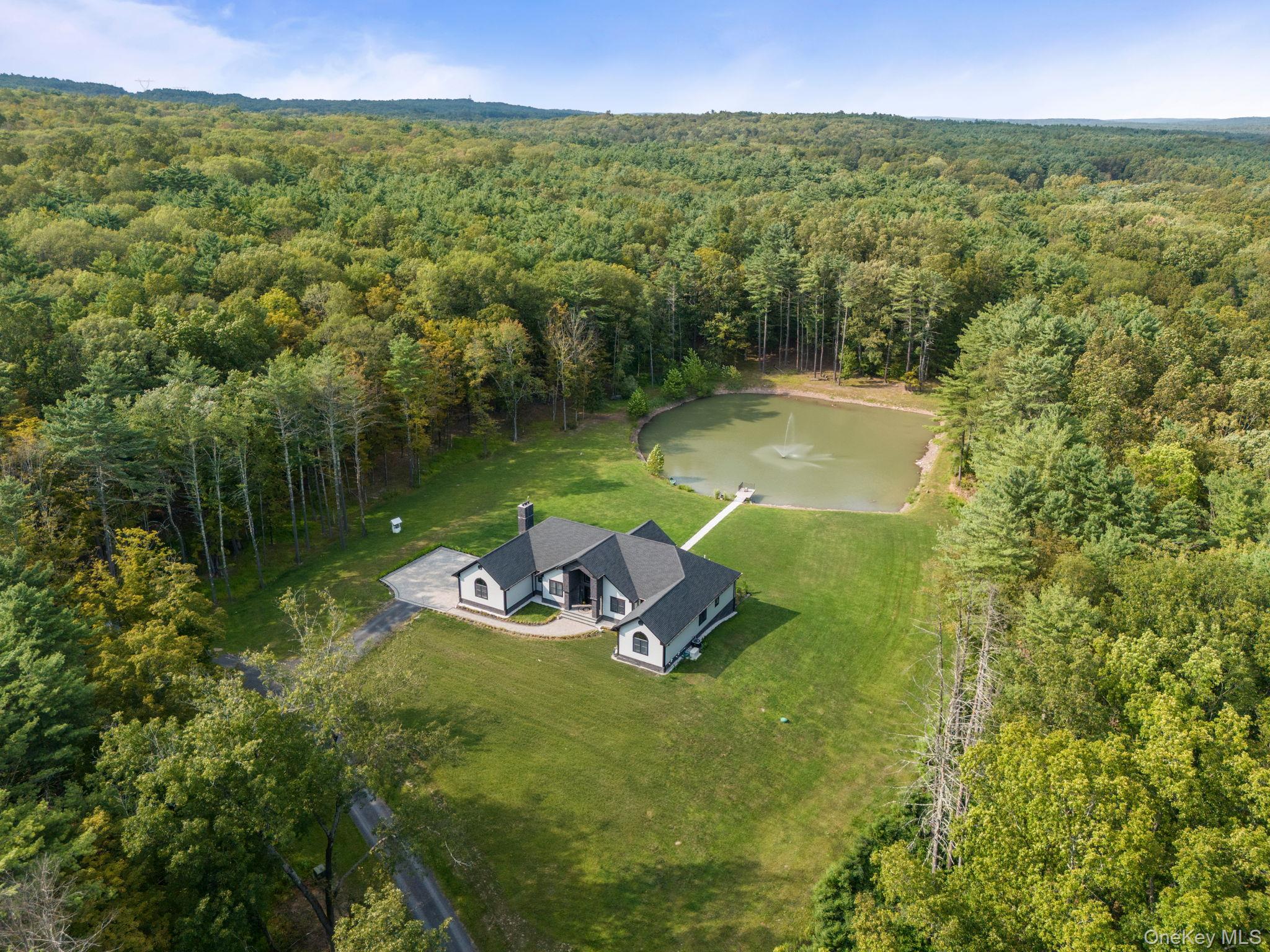 174 Webber Road Coxsackie, NY 12058 - Photo 50 of 50 a view of a lake with a yard
