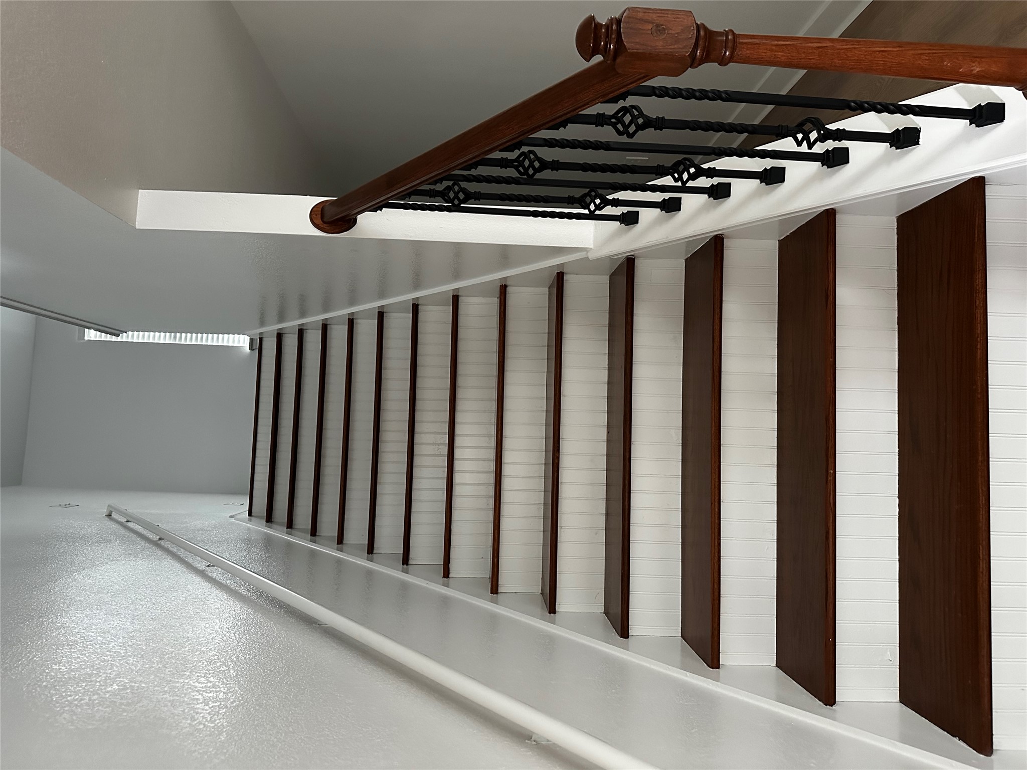 8016 Bannock Lane Austin, TX 78747 - Photo 13 of 32 Stairway with baseboards