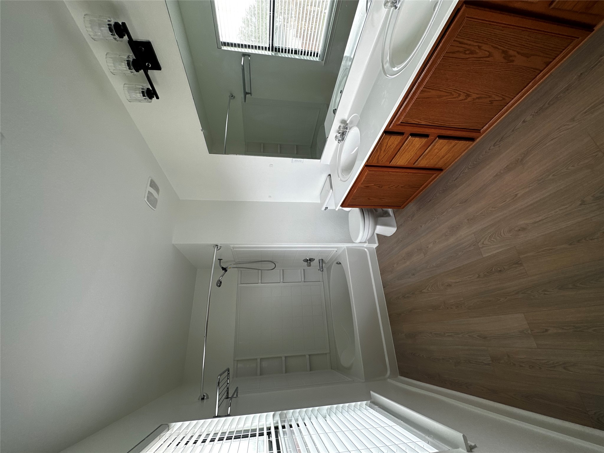8016 Bannock Lane Austin, TX 78747 - Photo 17 of 32 a view of kitchen with sink and wooden floor