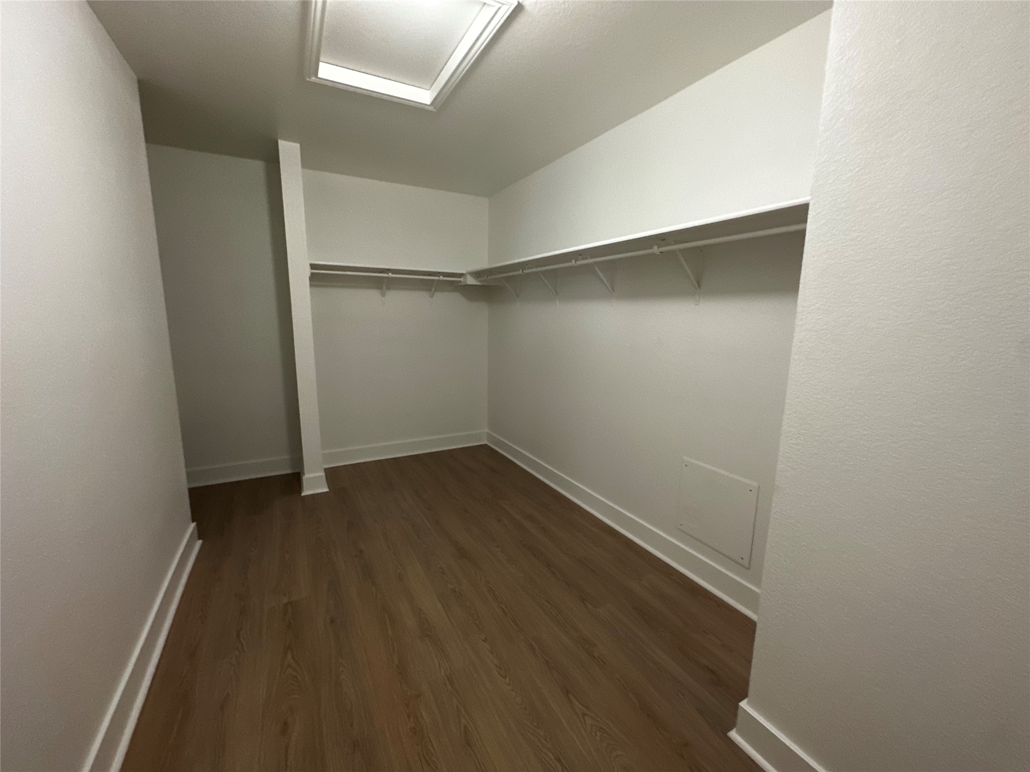 8016 Bannock Lane Austin, TX 78747 - Photo 18 of 32 a view of a room with wooden floor