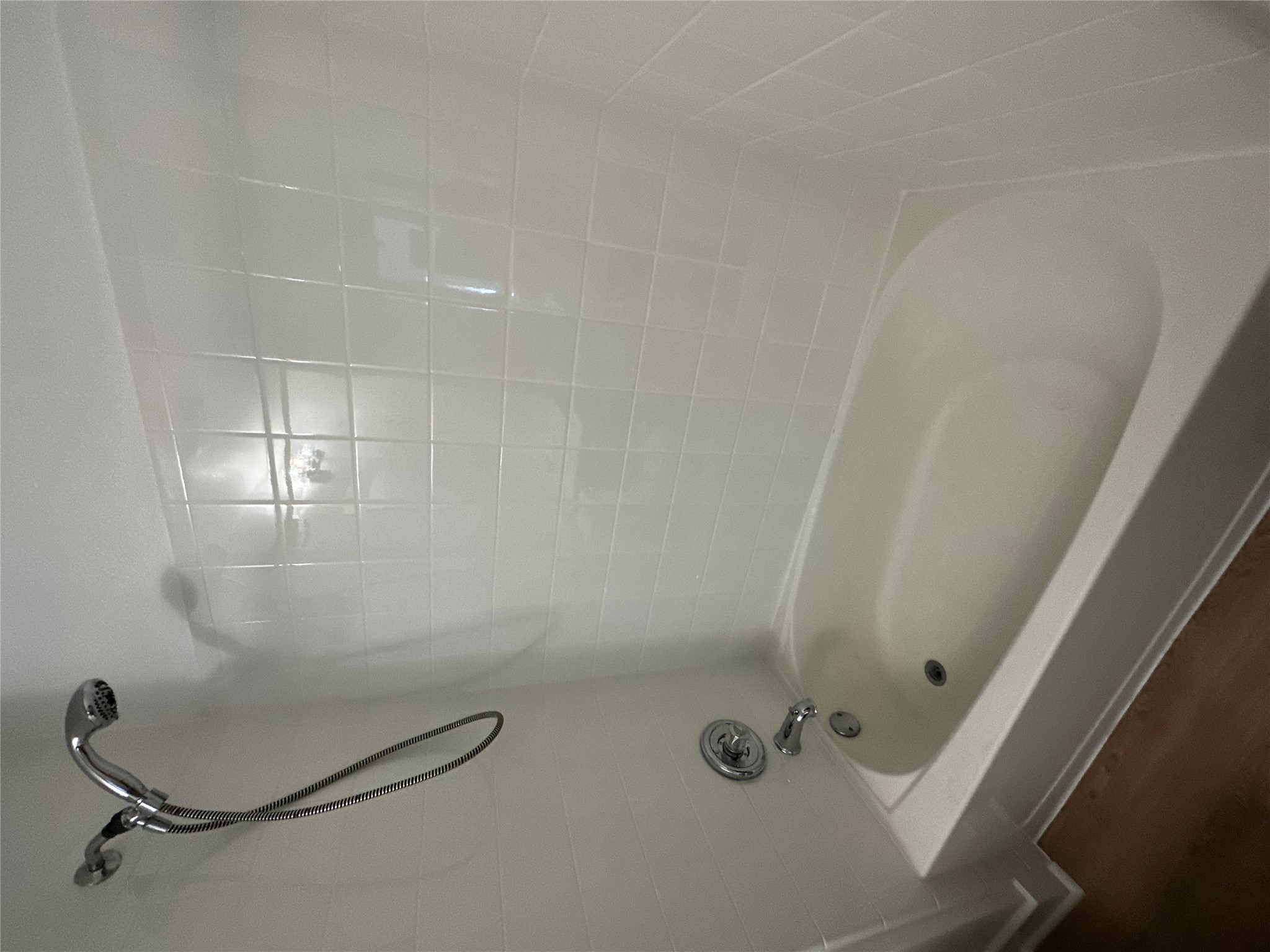 8016 Bannock Lane Austin, TX 78747 - Photo 23 of 32 a bathroom with a bathtub and shower