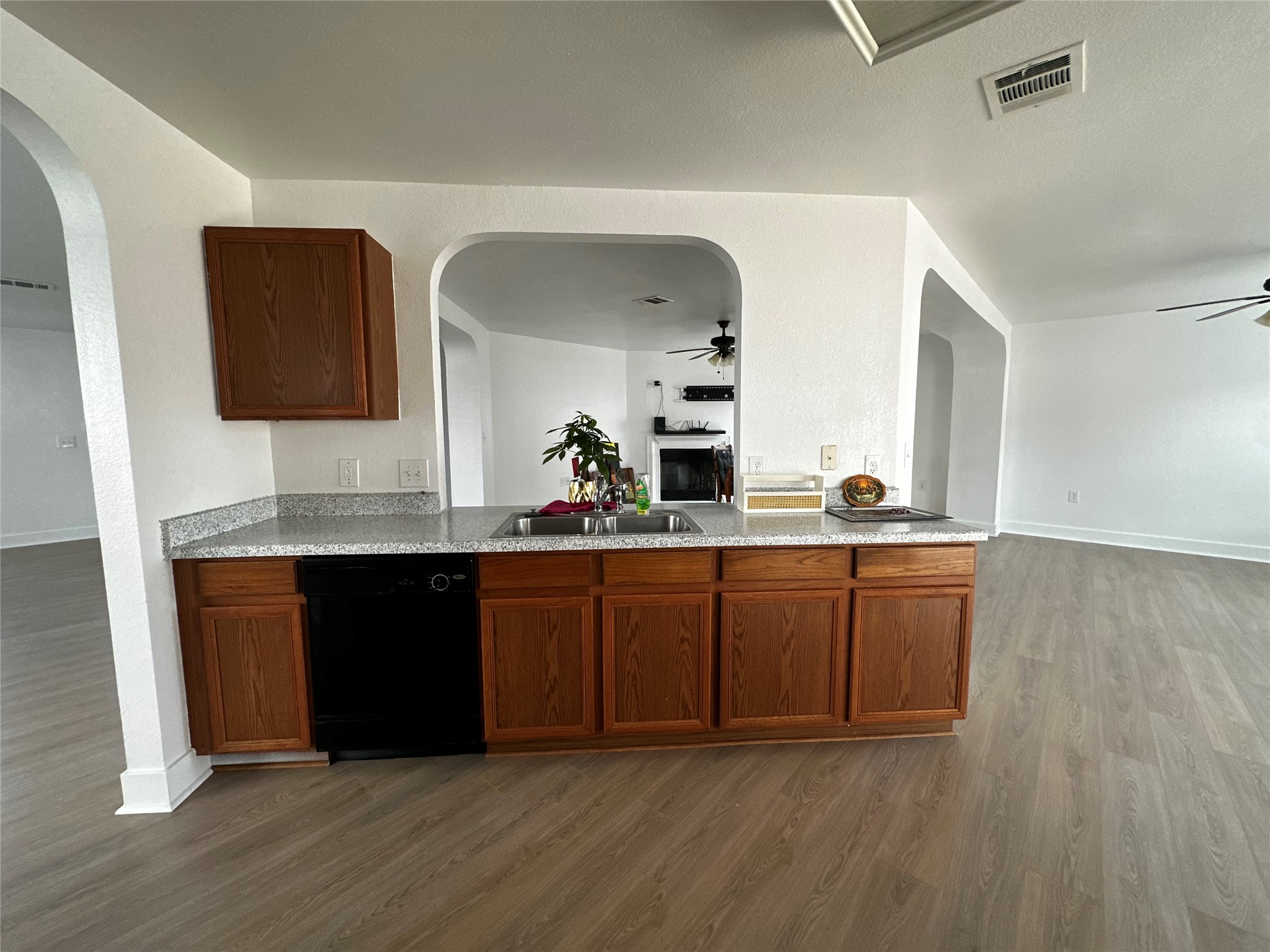 8016 Bannock Lane Austin, TX 78747 - Photo 31 of 32 a spacious bathroom with a double vanity sink and mirror