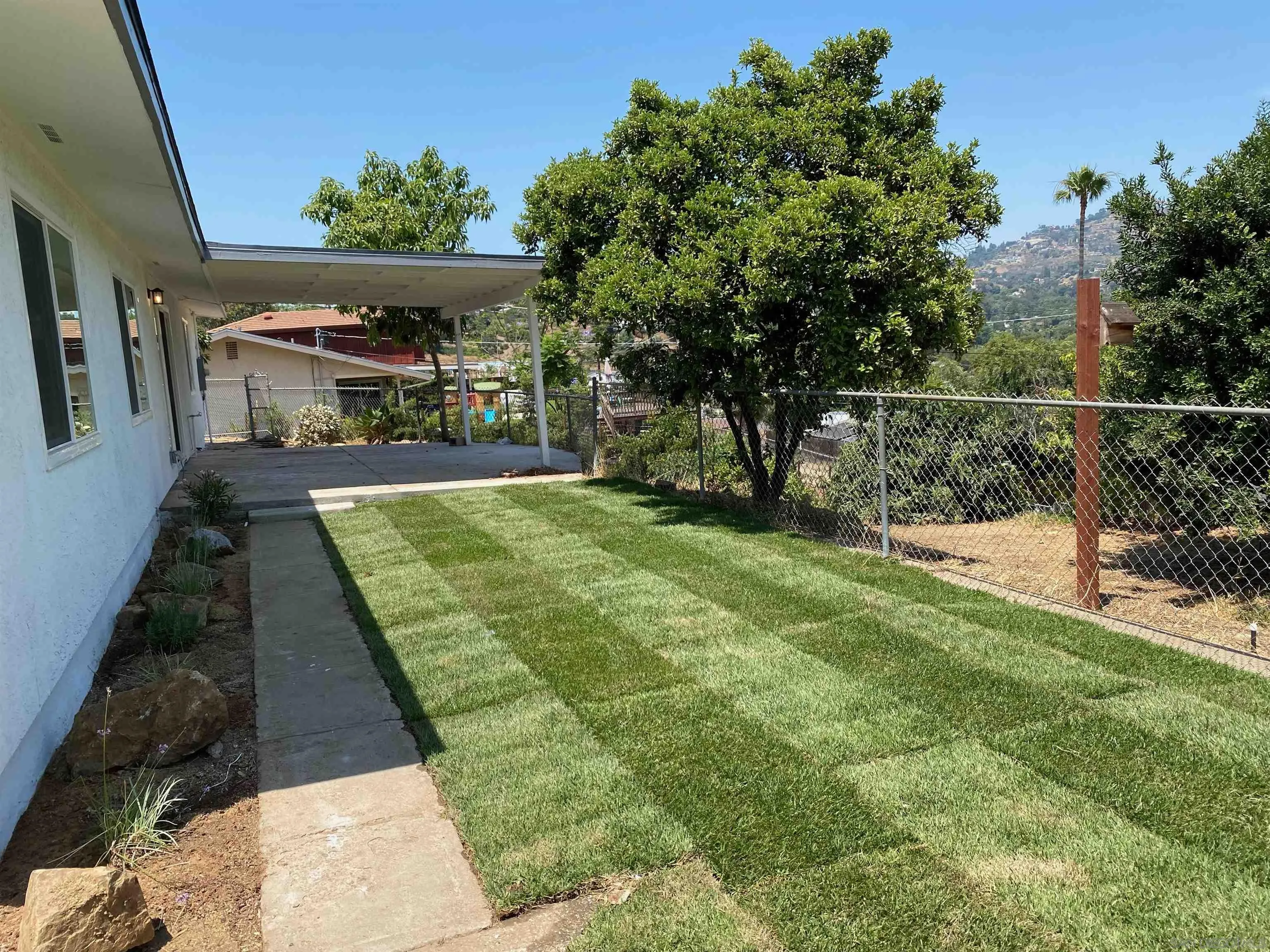 3866 Spring Drive Spring Valley, CA 91977 - Photo 9 of 9 a view of swimming pool with a yard