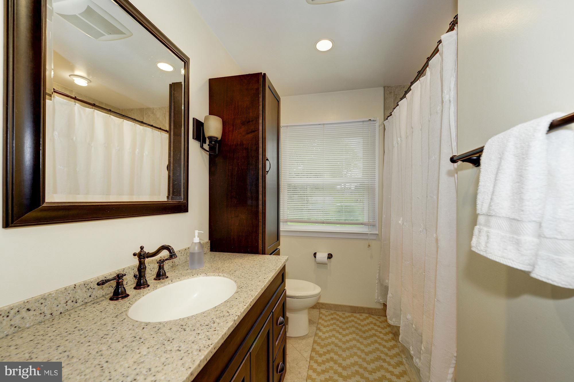 8706 Bradgate Road Alexandria, VA 22308 - Photo 19 of 31 Renovated full bath on main level