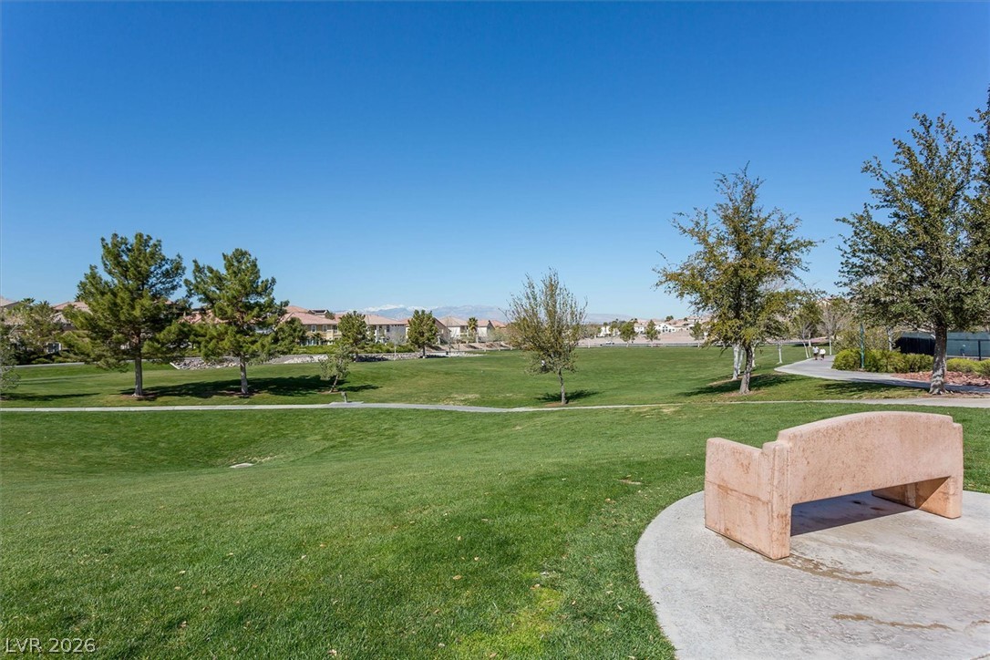 1259 Moon Vision Street Henderson, NV 89052 - Photo 42 of 53 Green open spaces and winding paths beckon for outdoor enjoyment within this vibrant community.