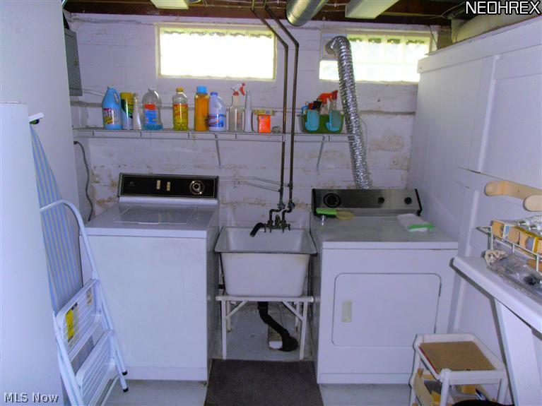 1052 Piermont Road Cleveland, OH 44121 - Photo 13 of 21 Lower Level laundry area with Washer and Dryer included