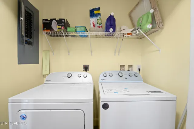 a utility room with dryer and washer