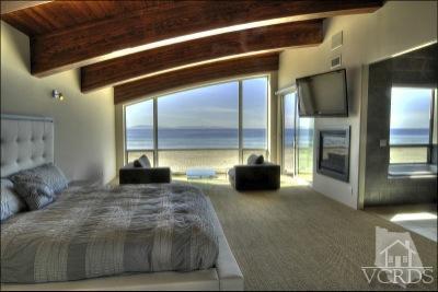 1013 Mandalay Beach Road Oxnard, CA 93035 - Photo 14 of 30 a living room with furniture and a floor to ceiling window