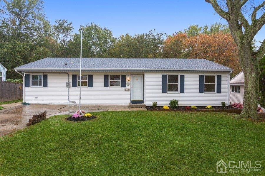 20 Brandeis Road Old Bridge, NJ 08859 - Photo 1 of 18 a front view of a house with a garden