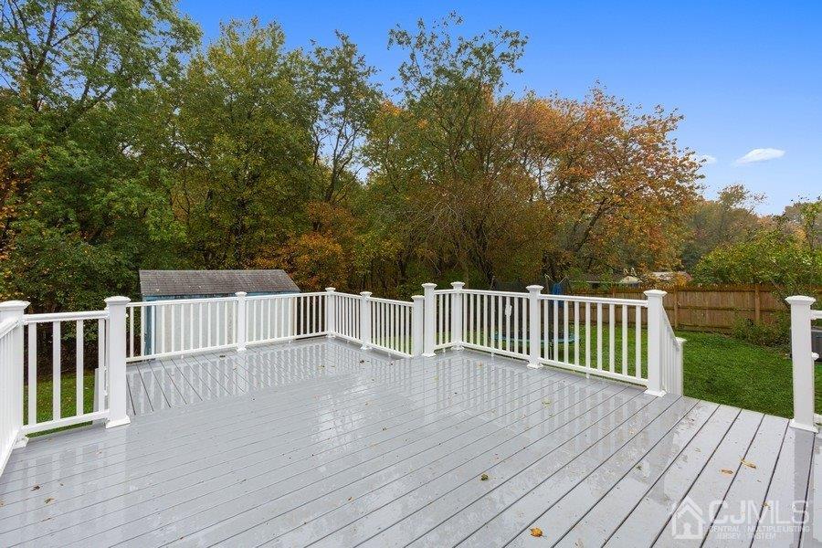 20 Brandeis Road Old Bridge, NJ 08859 - Photo 16 of 18 a view of deck with a garden