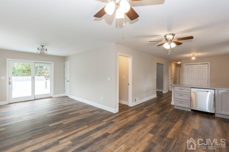 20 Brandeis Road Old Bridge, NJ 08859 - Photo 5 of 18 a view of an empty room with a window and wooden floor