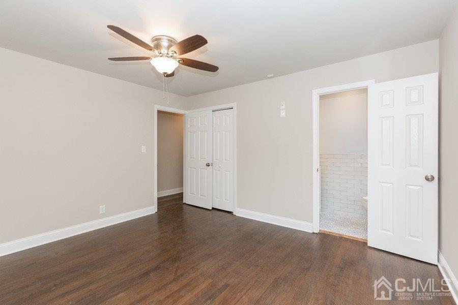 20 Brandeis Road Old Bridge, NJ 08859 - Photo 9 of 18 a view of an empty room with wooden floor