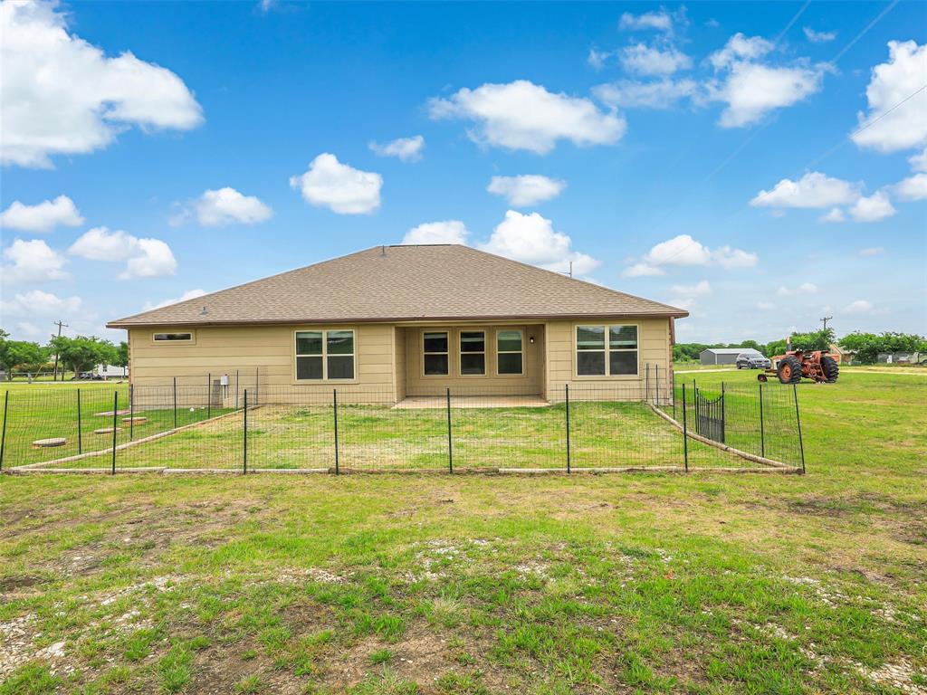 132 County Road 4213 Decatur, TX 76234 - Photo 27 of 27 a view of a house with a yard