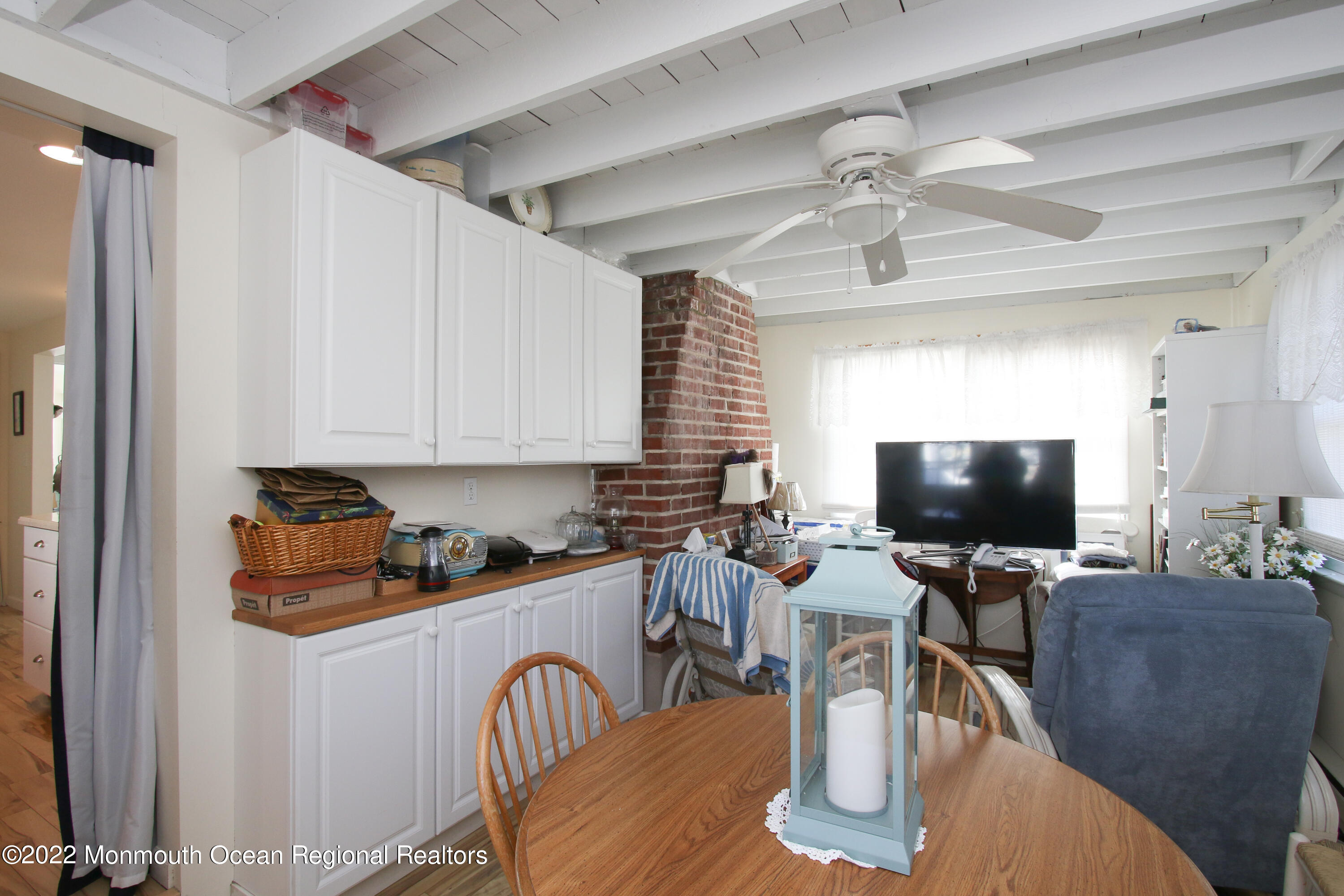 1401 Long Beach Boulevard Beach Haven, NJ 08008 - Photo 8 of 17 a work place with a computer on a desk and chair