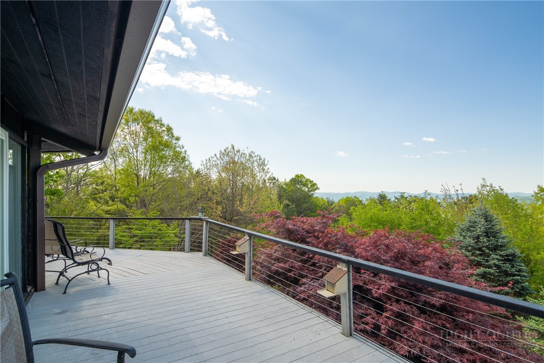 146 Cherokee Lane Purlear, NC 28665 - Photo 15 of 49 a view of a balcony with chairs