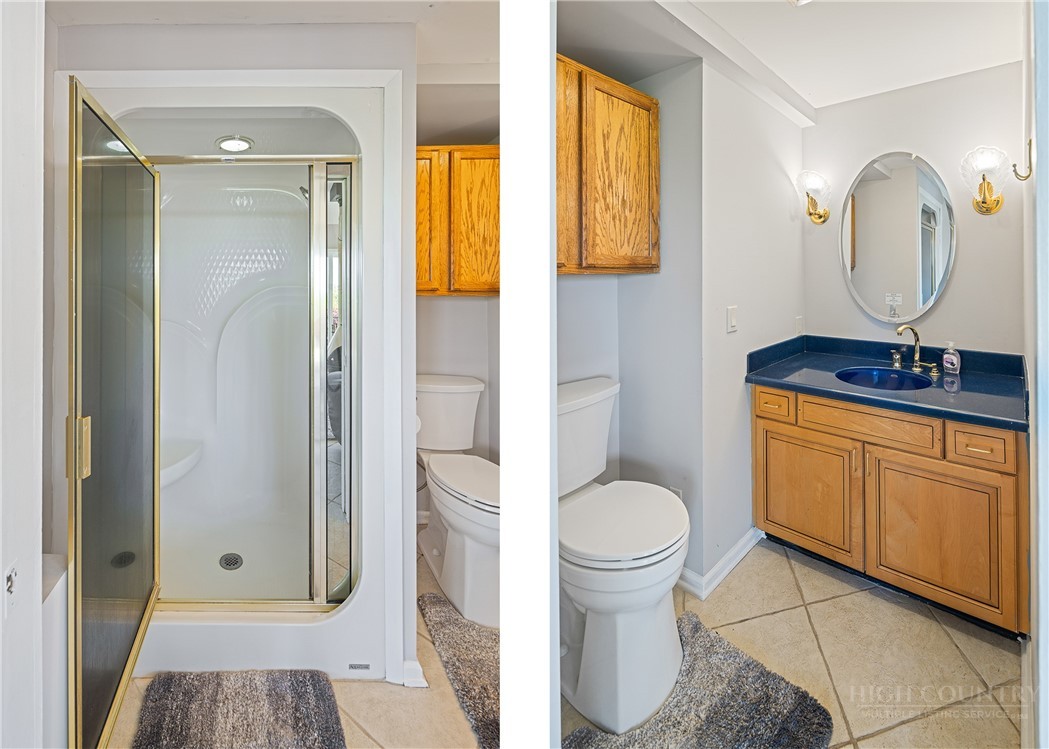 146 Cherokee Lane Purlear, NC 28665 - Photo 18 of 49 a bathroom with a toilet sink and mirror