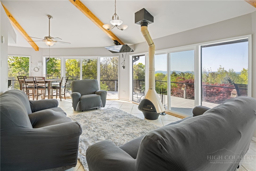 146 Cherokee Lane Purlear, NC 28665 - Photo 6 of 49 a living room with furniture and a large window