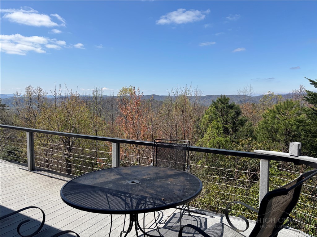 146 Cherokee Lane Purlear, NC 28665 - Photo 7 of 49 a view of a balcony with chairs
